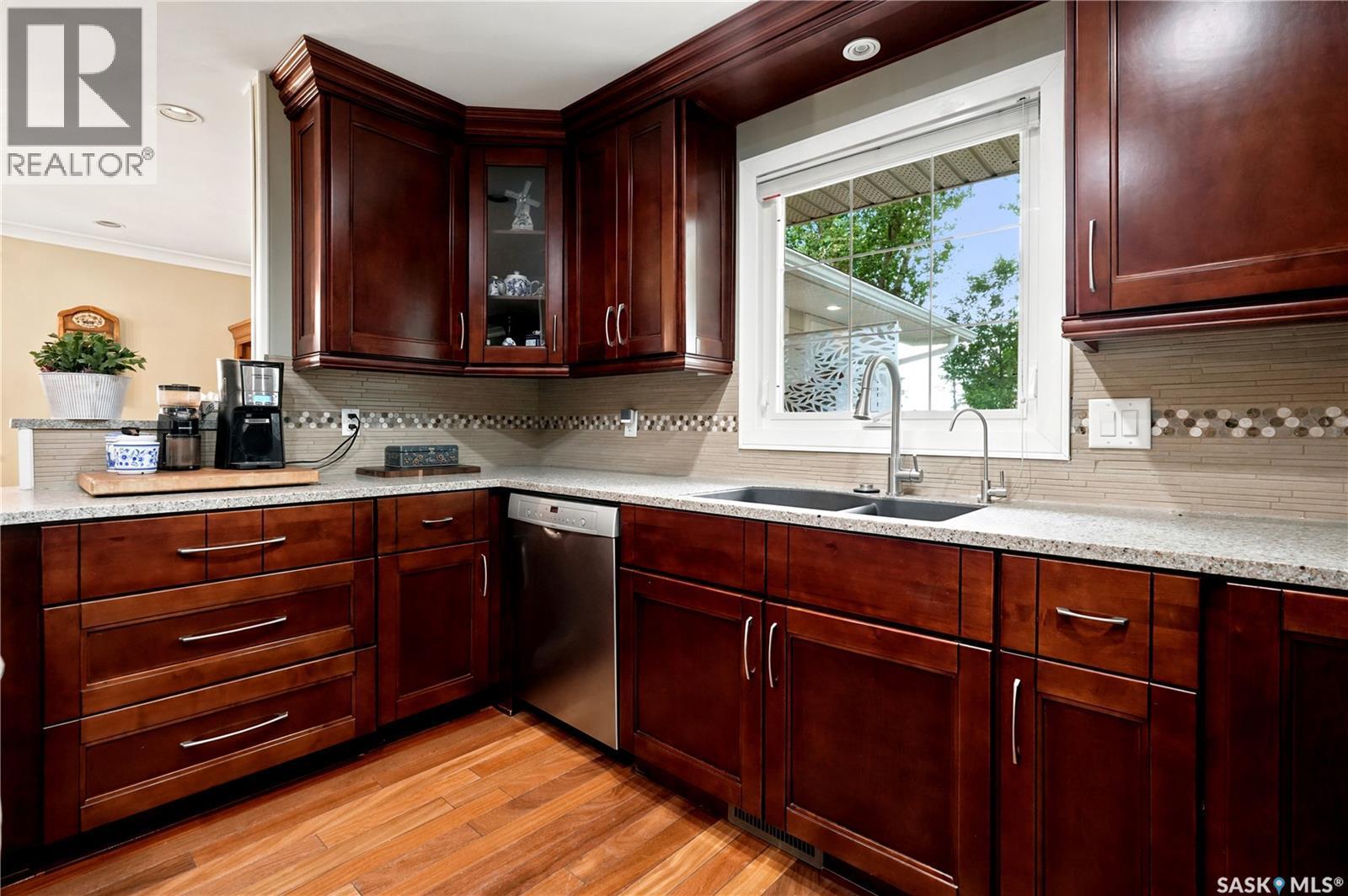 22 Wesson Bay, Regina, SK - Indoor Photo Showing Kitchen With Double Sink