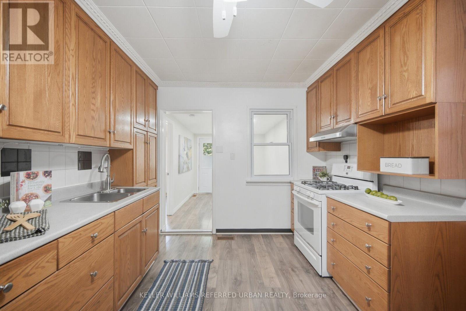 153 Mcintosh Street, Toronto, ON - Indoor Photo Showing Kitchen With Double Sink