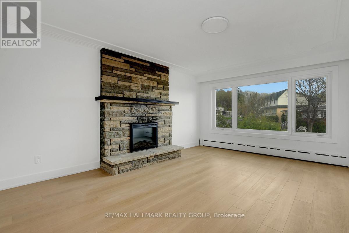 269 Michel Circle, Ottawa, ON - Indoor Photo Showing Living Room With Fireplace