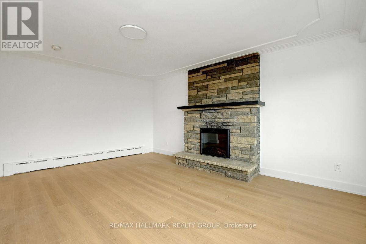 269 Michel Circle, Ottawa, ON - Indoor Photo Showing Living Room With Fireplace