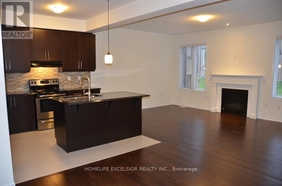 130 Major Crescent, Aurora, ON - Indoor Photo Showing Kitchen With Fireplace