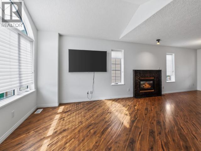4 Ruby Lane, Whitehorse, YT - Indoor Photo Showing Living Room With Fireplace