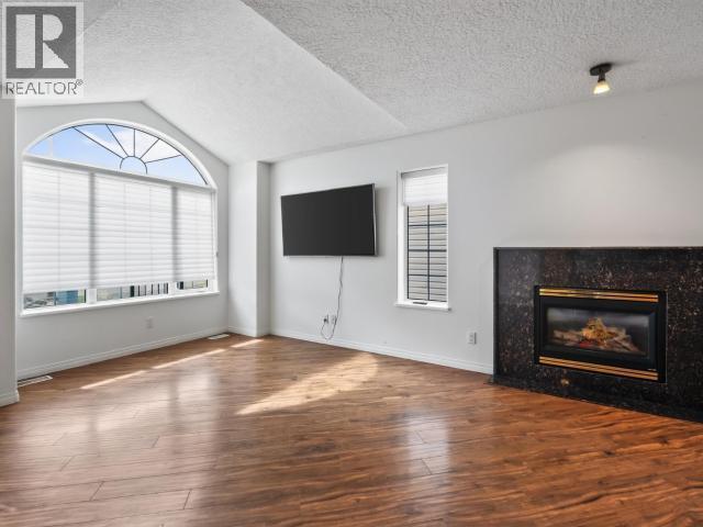4 Ruby Lane, Whitehorse, YT - Indoor Photo Showing Living Room With Fireplace