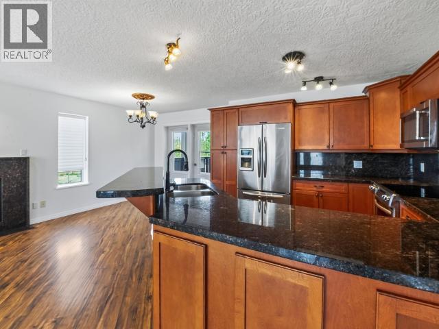 4 Ruby Lane, Whitehorse, YT - Indoor Photo Showing Kitchen With Double Sink