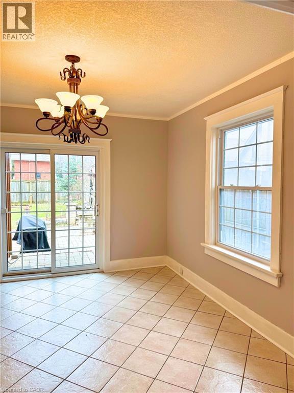 Dining Room with sliders to back patio - 9 Filbert Street, Kitchener, ON - Indoor Photo Showing Other Room