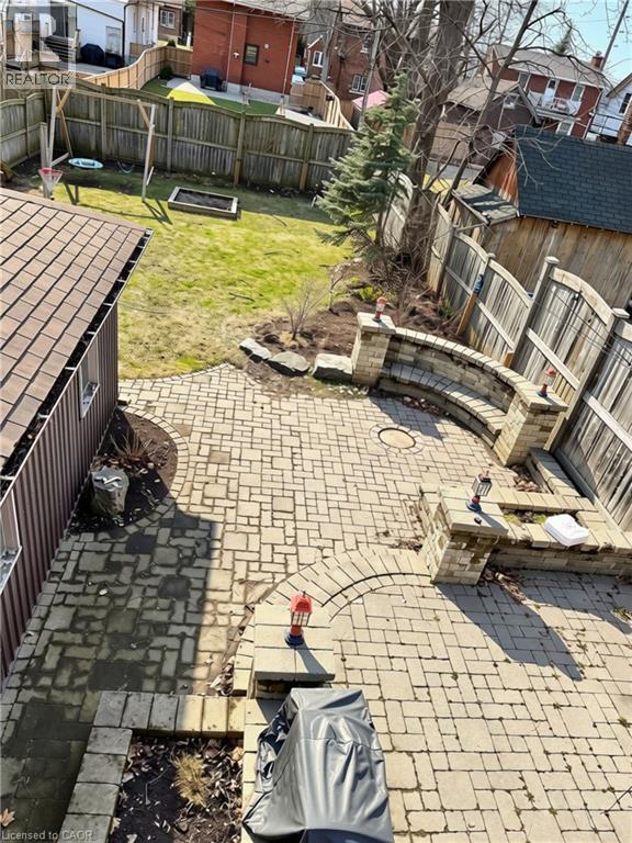 Private yard with patio and grass - 9 Filbert Street, Kitchener, ON - Outdoor With Deck Patio Veranda