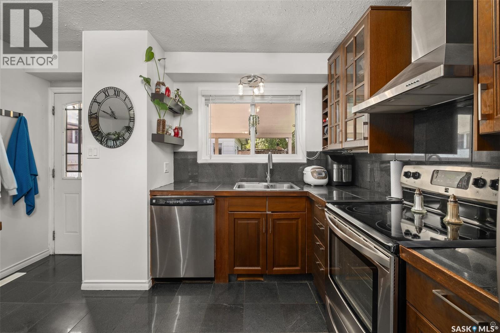 3075 Sherman Drive, Prince Albert, SK - Indoor Photo Showing Kitchen With Double Sink