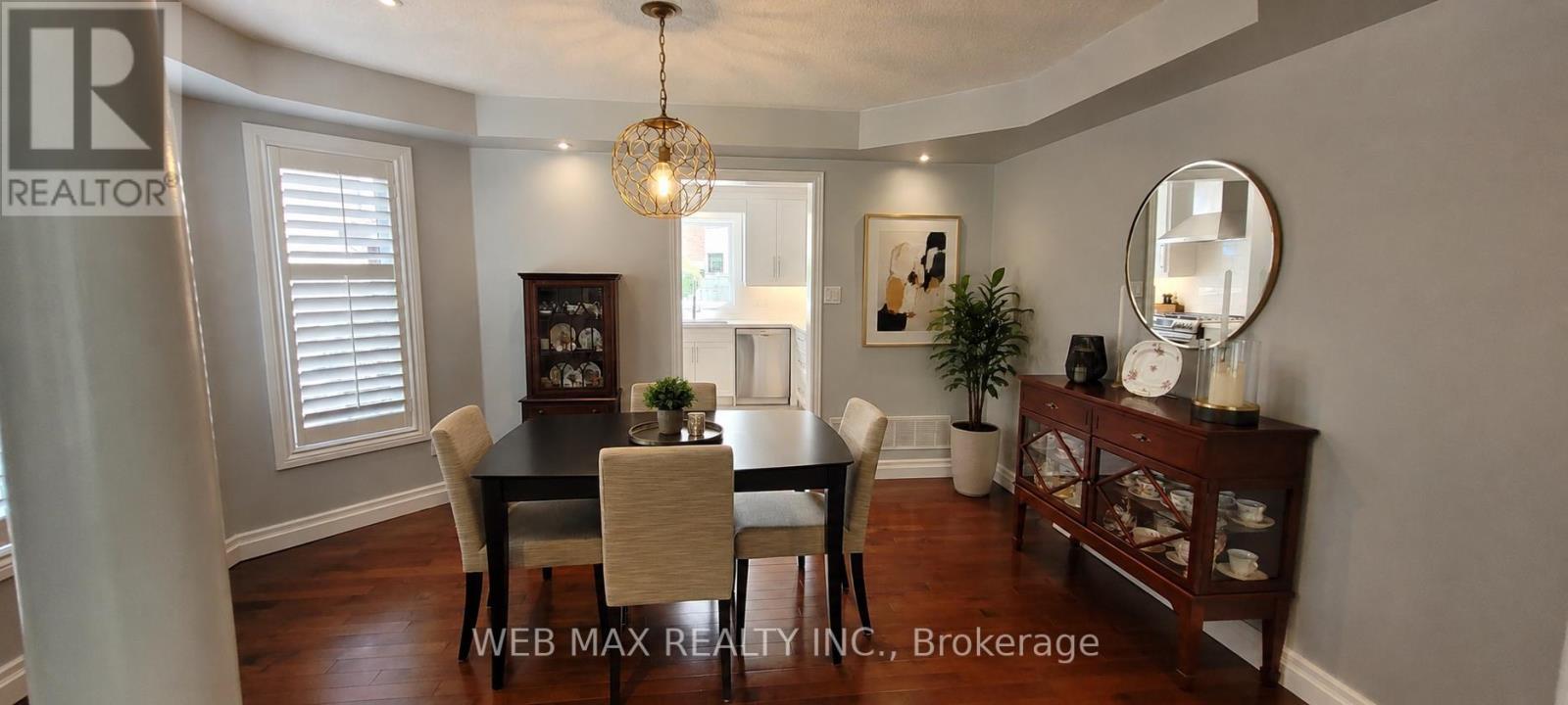 spacious dining room, hardwood,bow window,shutters - 22 Ashbury Crescent, Caledon, ON - Indoor Photo Showing Dining Room