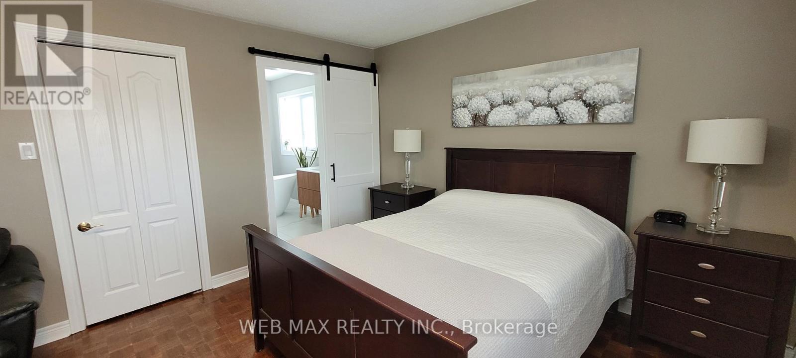 Spacious Prime bedroom walkin closet,parquet - 22 Ashbury Crescent, Caledon, ON - Indoor Photo Showing Bedroom