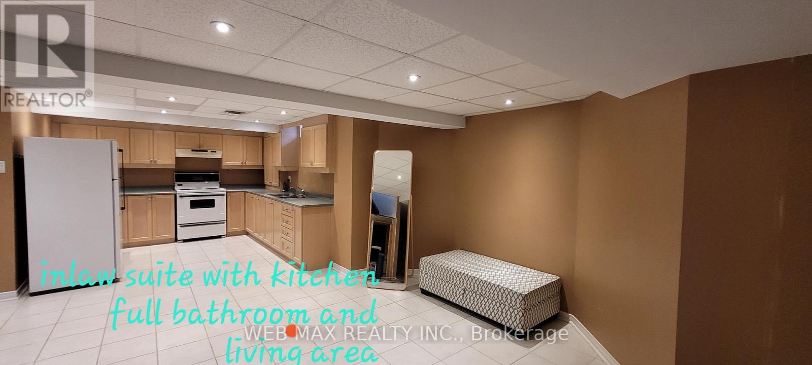 Large kitchen and recreational area in basement - 22 Ashbury Crescent, Caledon, ON - Indoor Photo Showing Other Room
