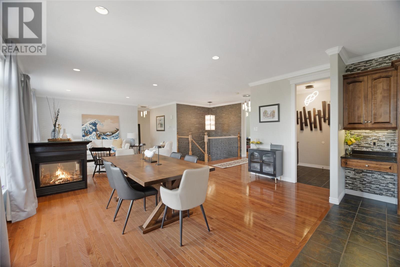 206 Summit Drive, Paradise, NL - Indoor Photo Showing Dining Room With Fireplace