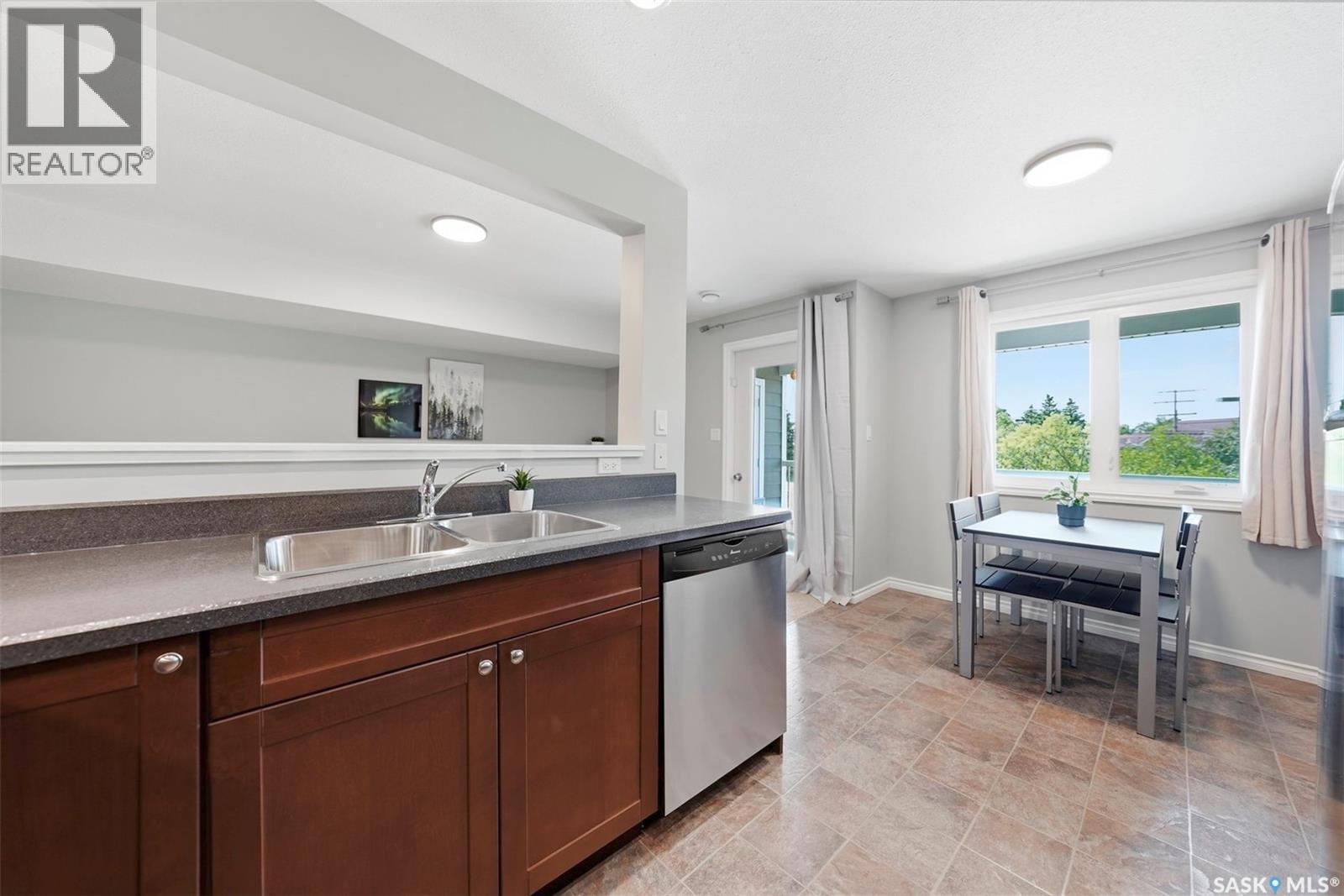 203 515 28Th Street E, Prince Albert, SK - Indoor Photo Showing Kitchen With Double Sink