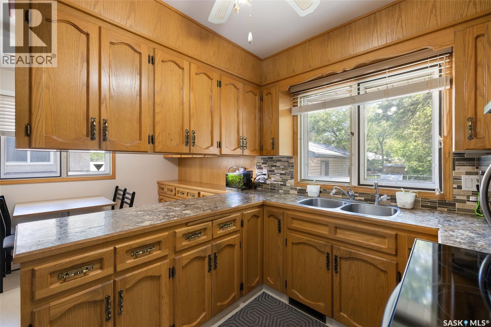 4343 England Road, Regina, SK - Indoor Photo Showing Kitchen With Double Sink