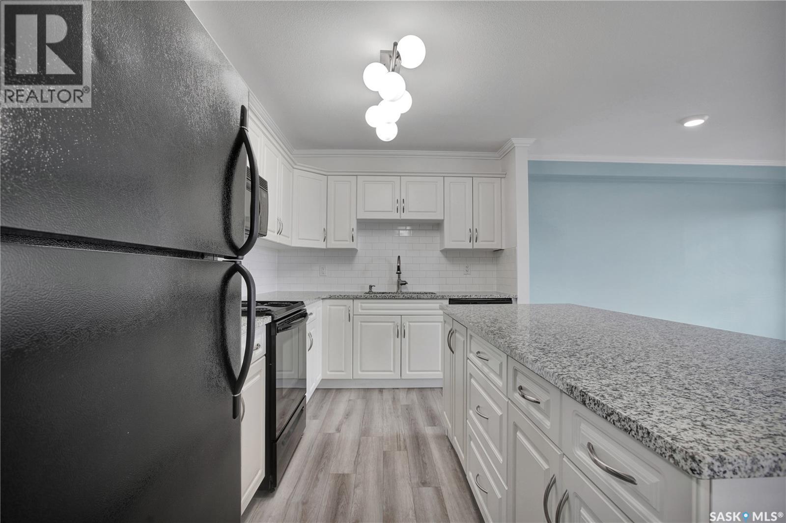 405 600 Centennial Boulevard, Warman, SK - Indoor Photo Showing Kitchen With Upgraded Kitchen