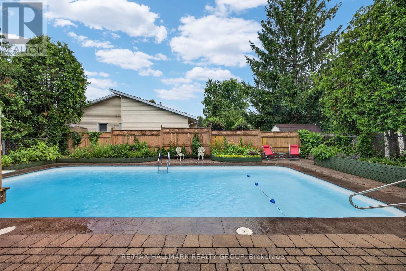 1100 Bathgate Drive, Ottawa, ON - Outdoor With In Ground Pool With Backyard