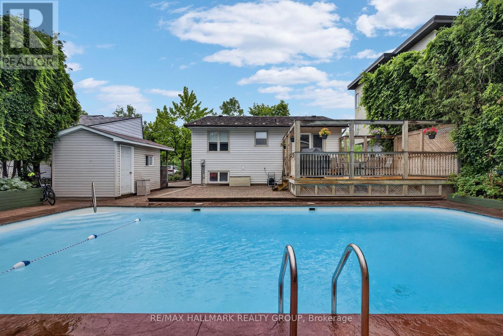 1100 Bathgate Drive, Ottawa, ON - Outdoor With In Ground Pool With Deck Patio Veranda With Backyard