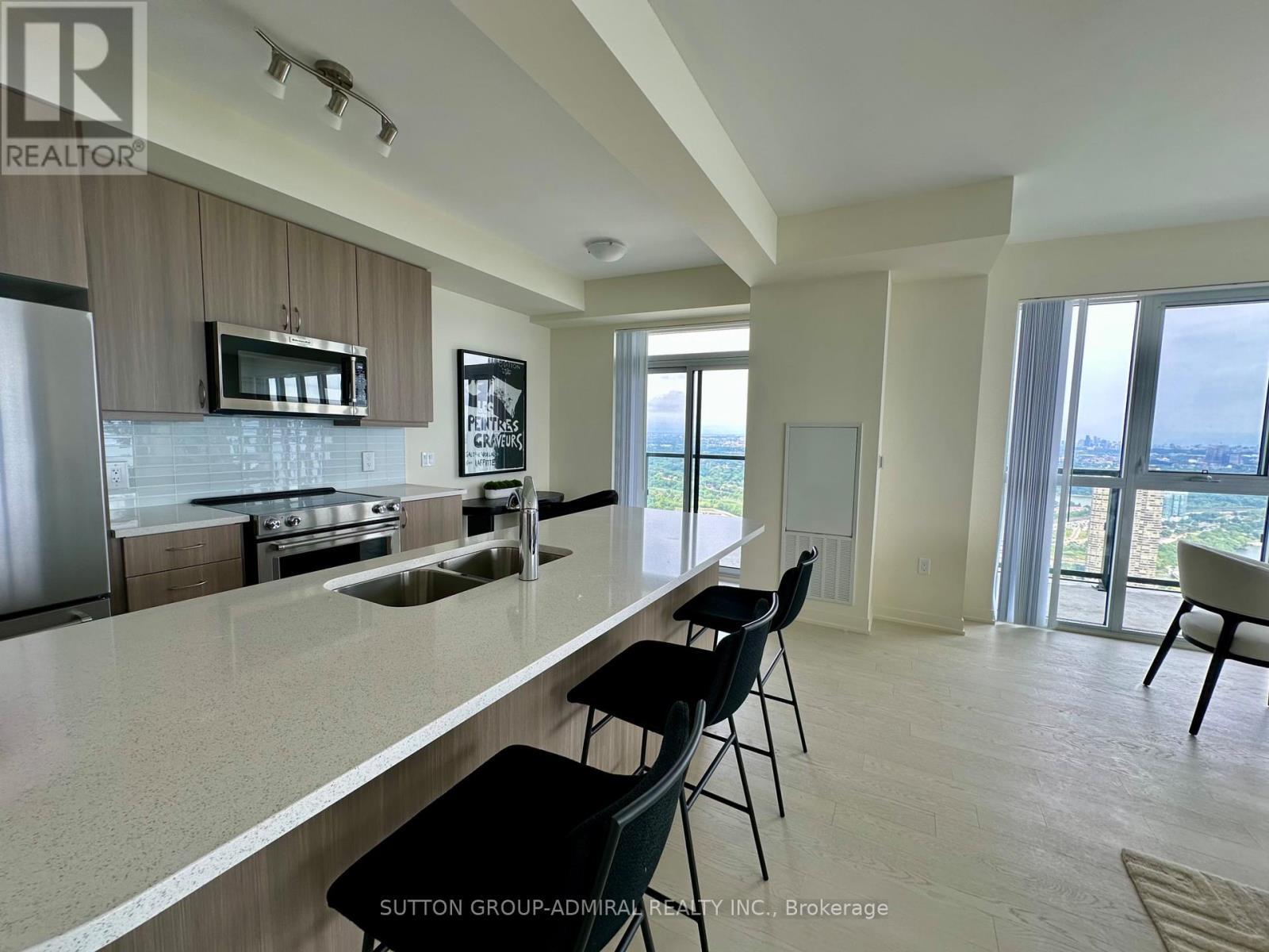 Ph102 - 38 Annie Craig Drive, Toronto, ON - Indoor Photo Showing Kitchen With Double Sink With Upgraded Kitchen