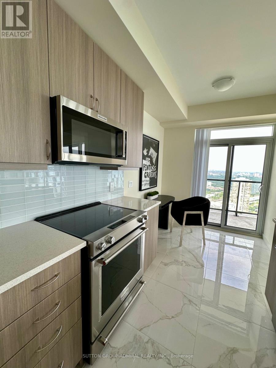Ph102 - 38 Annie Craig Drive, Toronto, ON - Indoor Photo Showing Kitchen