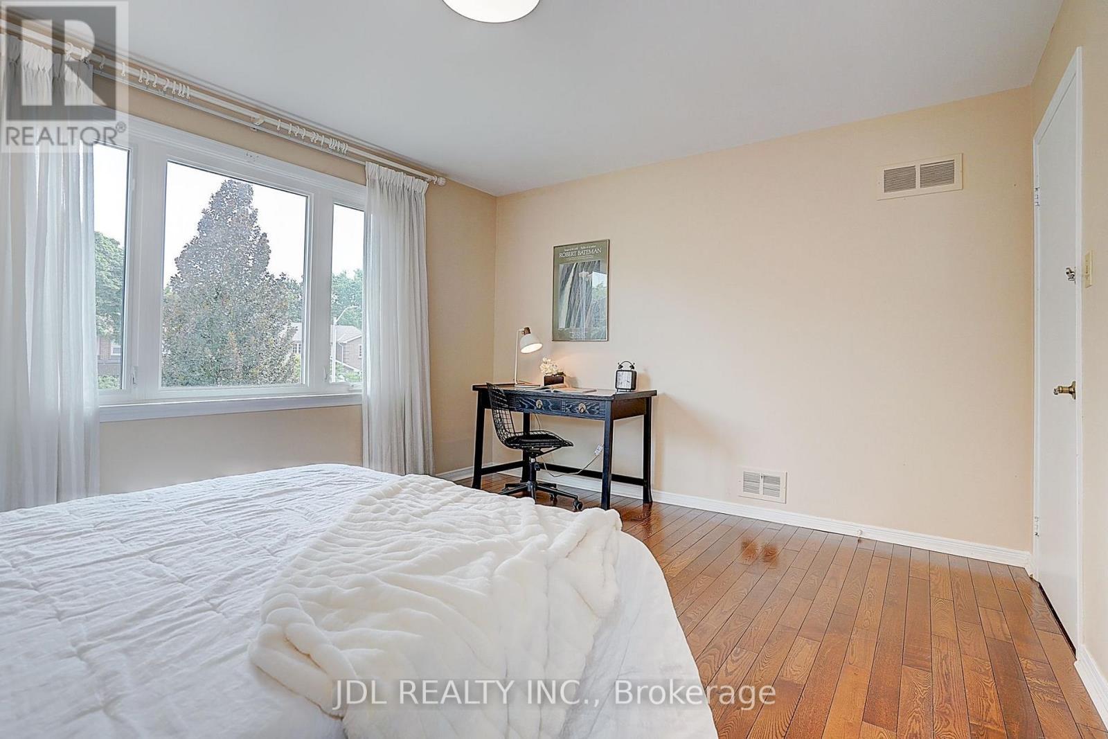 20 Mossgrove Trail, Toronto, ON - Indoor Photo Showing Bedroom
