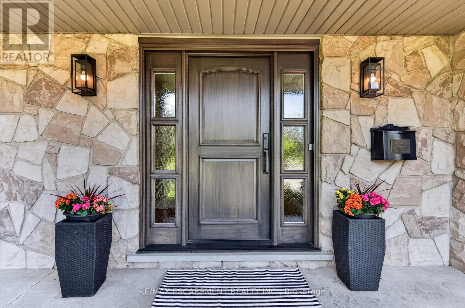 What an entrance! - 4461 Tremineer Avenue, Burlington, ON - Outdoor With Deck Patio Veranda