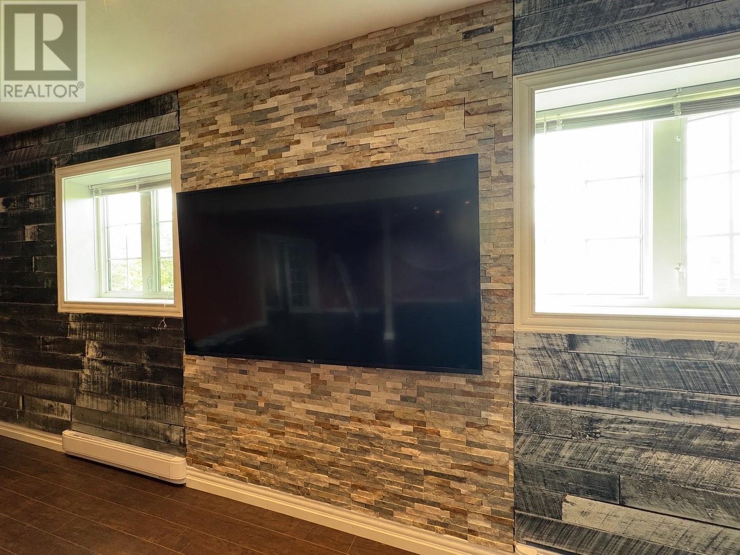 9 Davis Drive, Mount Moriah, NL - Indoor With Fireplace