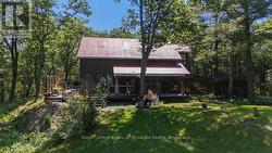 side of home - covered deck -