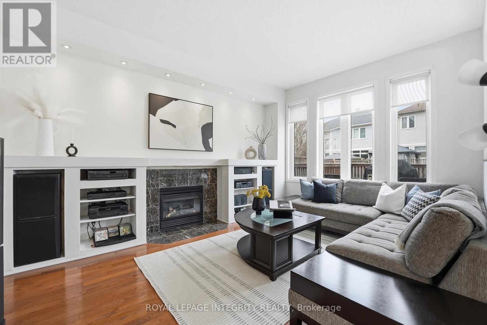 46 Catterick Crescent, Ottawa, ON - Indoor Photo Showing Living Room With Fireplace