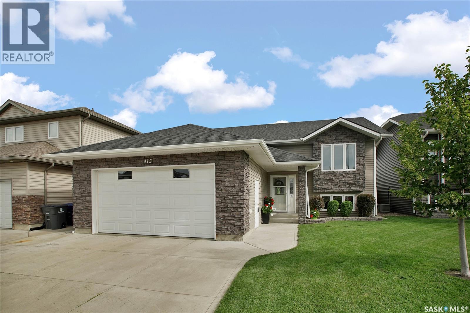 412 Lyle Crescent, Warman, SK - Outdoor With Facade