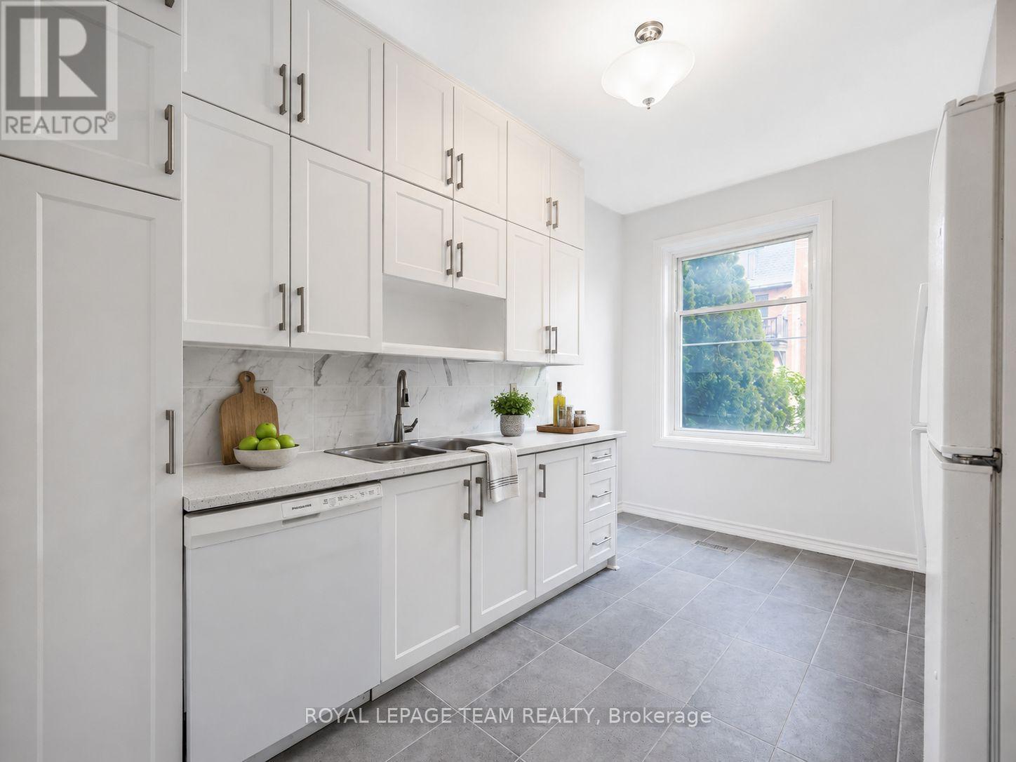 Virtually Staged - 301 Somerset Street E, Ottawa, ON - Indoor Photo Showing Kitchen With Double Sink