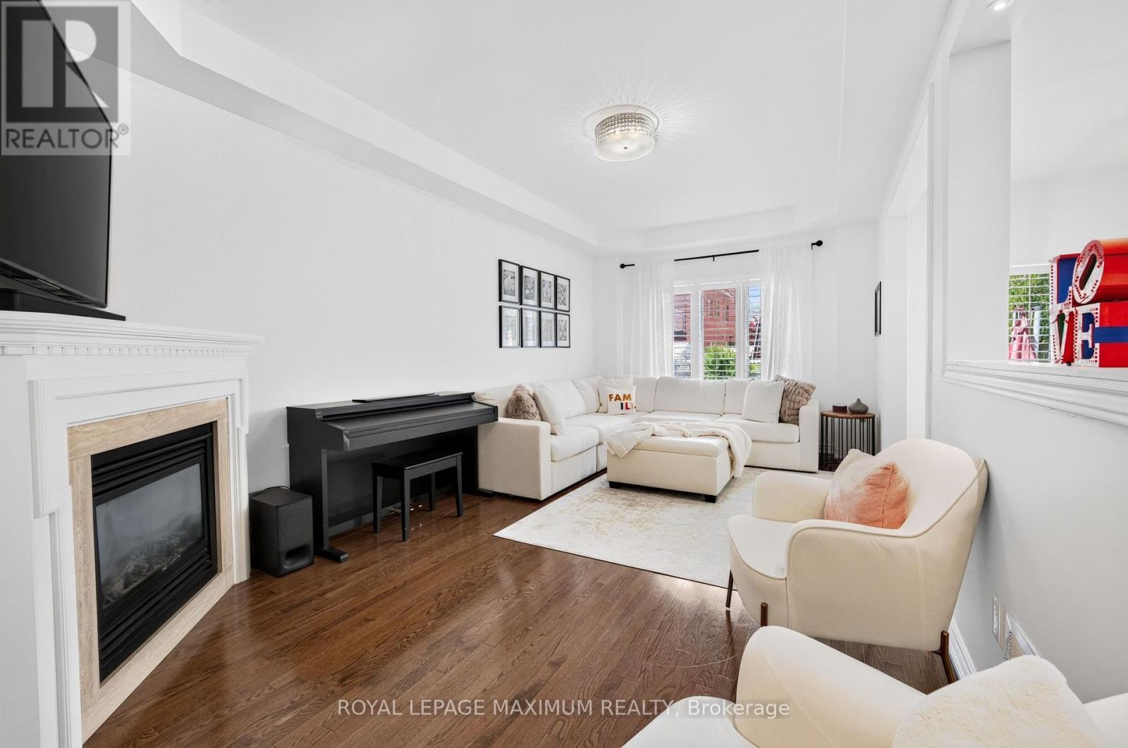 95 White Beach Crescent, Vaughan, ON - Indoor Photo Showing Living Room With Fireplace