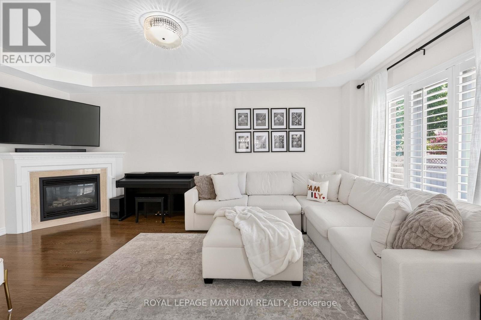 95 White Beach Crescent, Vaughan, ON - Indoor Photo Showing Living Room With Fireplace