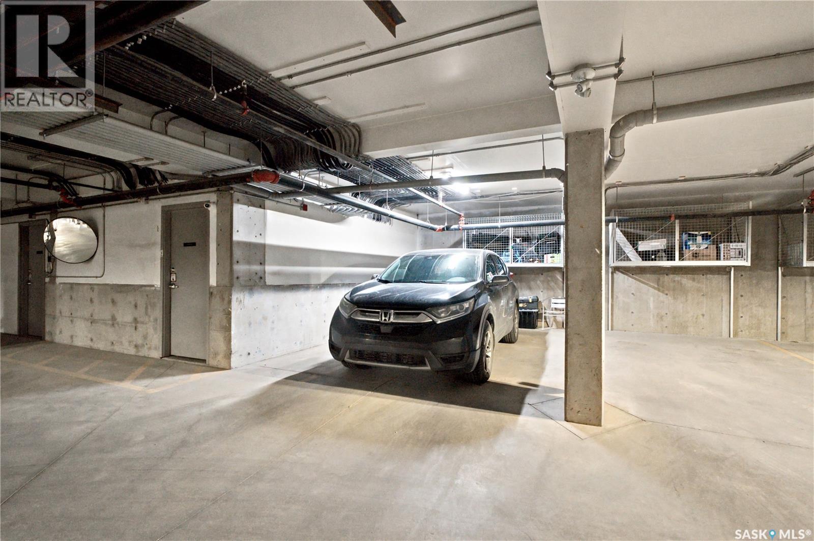214 545 Hassard Close, Saskatoon, SK - Indoor Photo Showing Garage