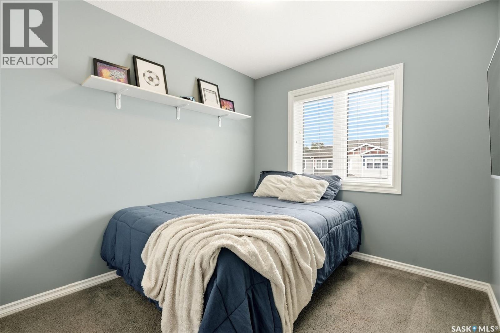 143 1920 7Th Avenue E, Regina, SK - Indoor Photo Showing Bedroom