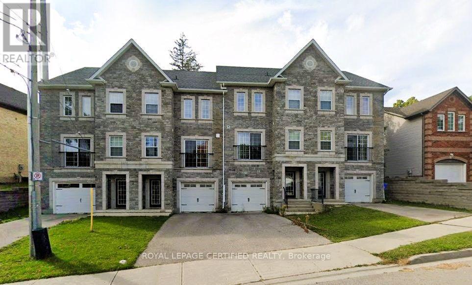 57 Woolwich Street, Kitchener, ON - Outdoor With Facade
