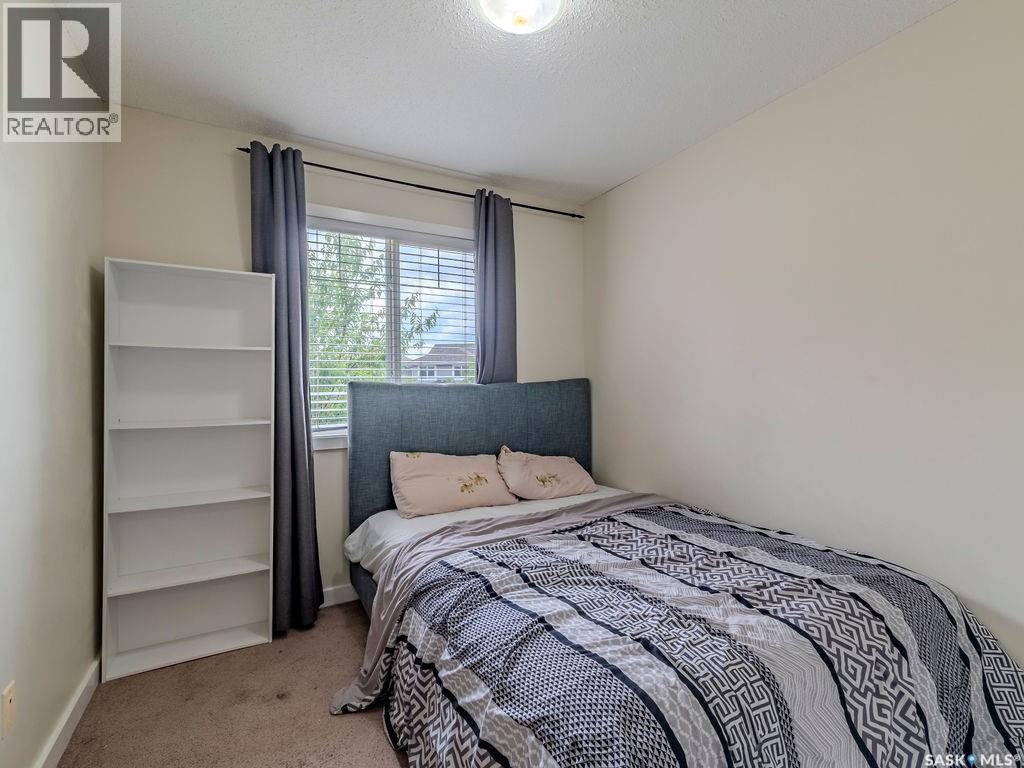 143 135 Ashworth Crescent, Saskatoon, SK - Indoor Photo Showing Bedroom