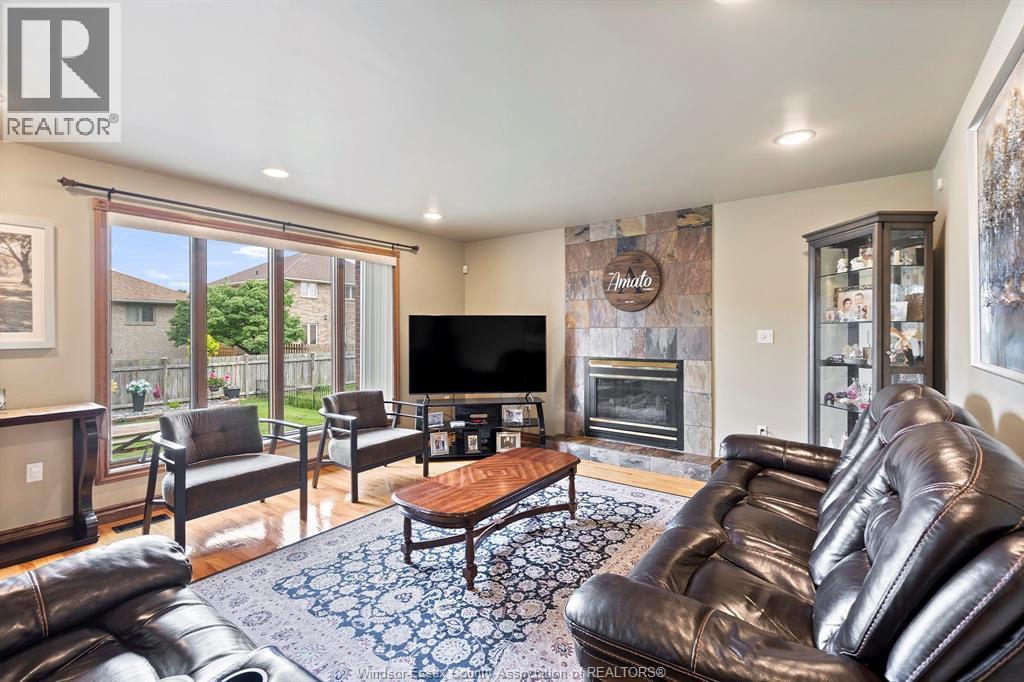 2648 Fleming, Windsor, ON - Indoor Photo Showing Living Room With Fireplace