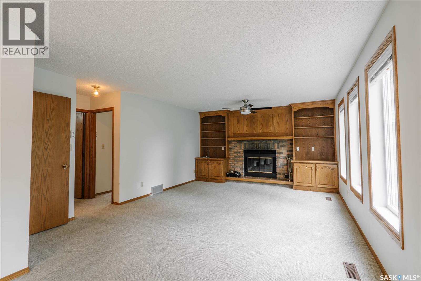 3338 Calder Crescent, Saskatoon, SK - Indoor With Fireplace