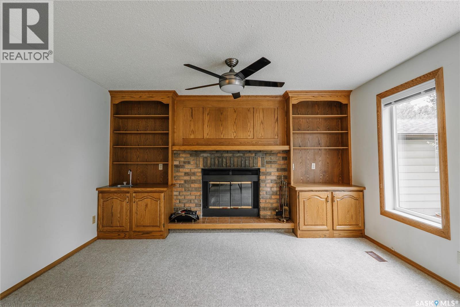 3338 Calder Crescent, Saskatoon, SK - Indoor With Fireplace