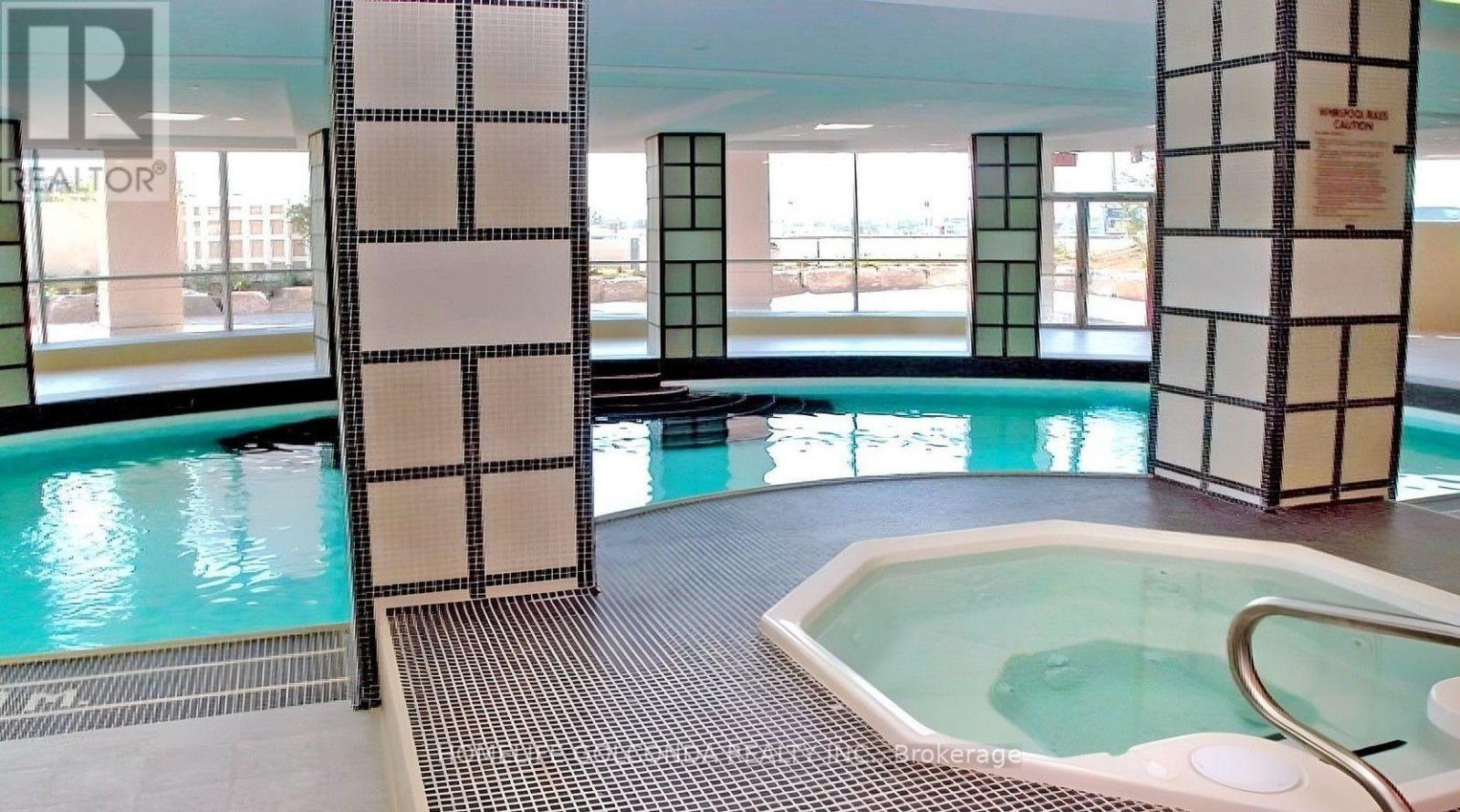 720 - 33 Cox Boulevard, Markham, ON - Indoor Photo Showing Other Room With In Ground Pool