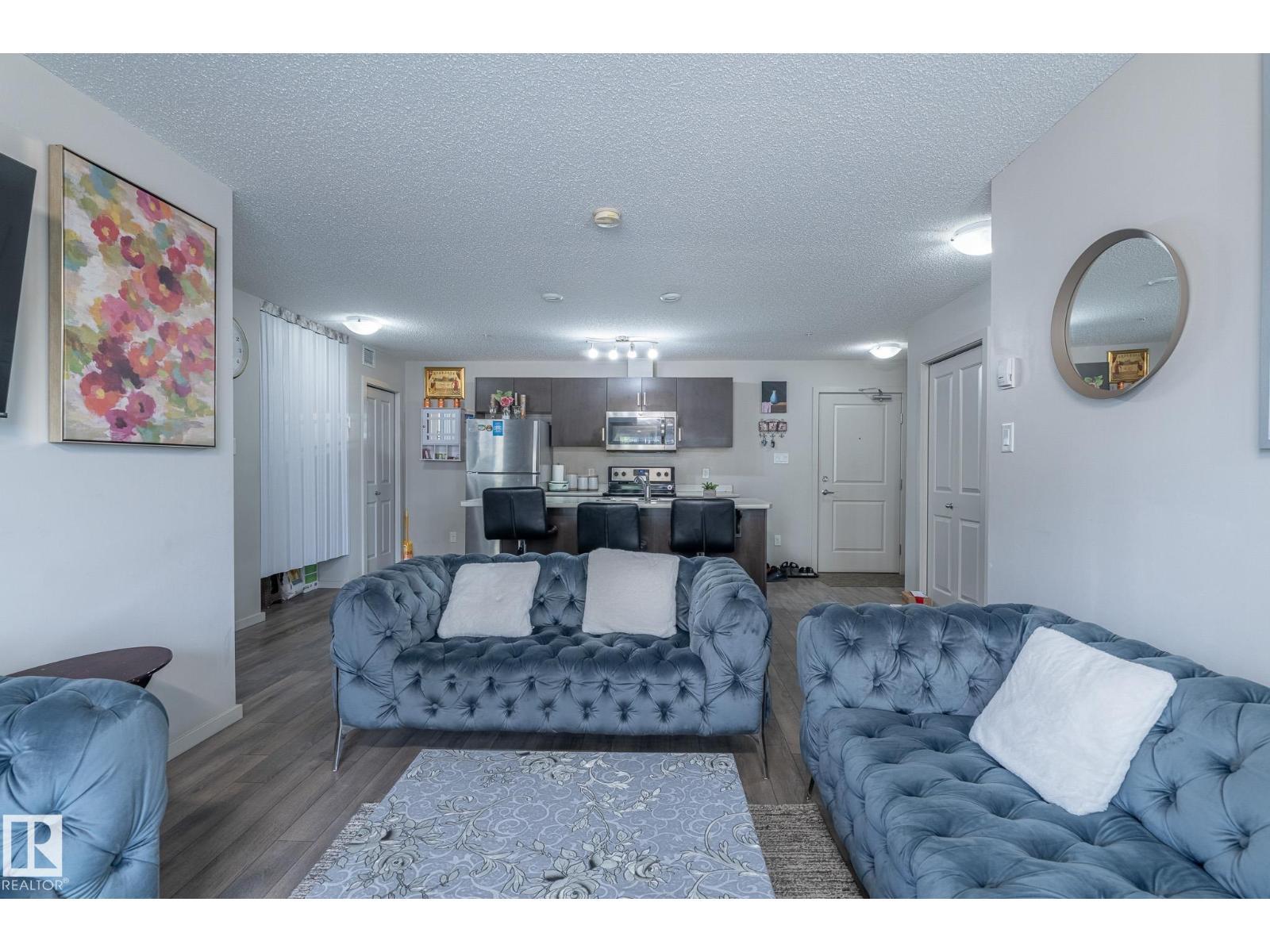 #107 142 Ebbers Bv Nw, Edmonton, AB - Indoor Photo Showing Living Room