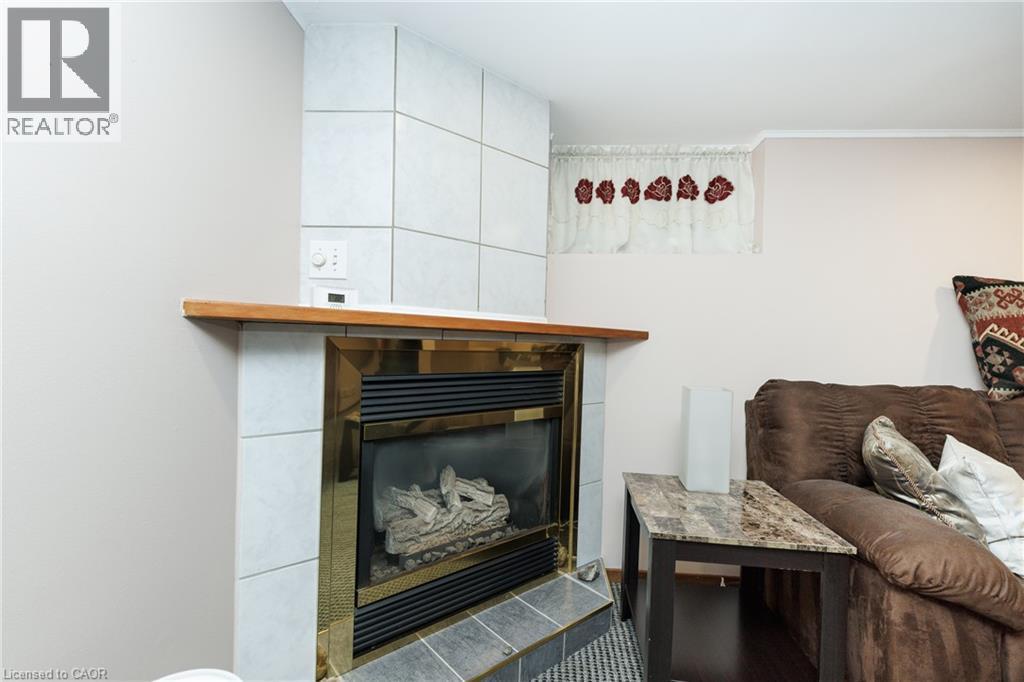 237 Paling Avenue, Hamilton, ON - Indoor Photo Showing Other Room With Fireplace