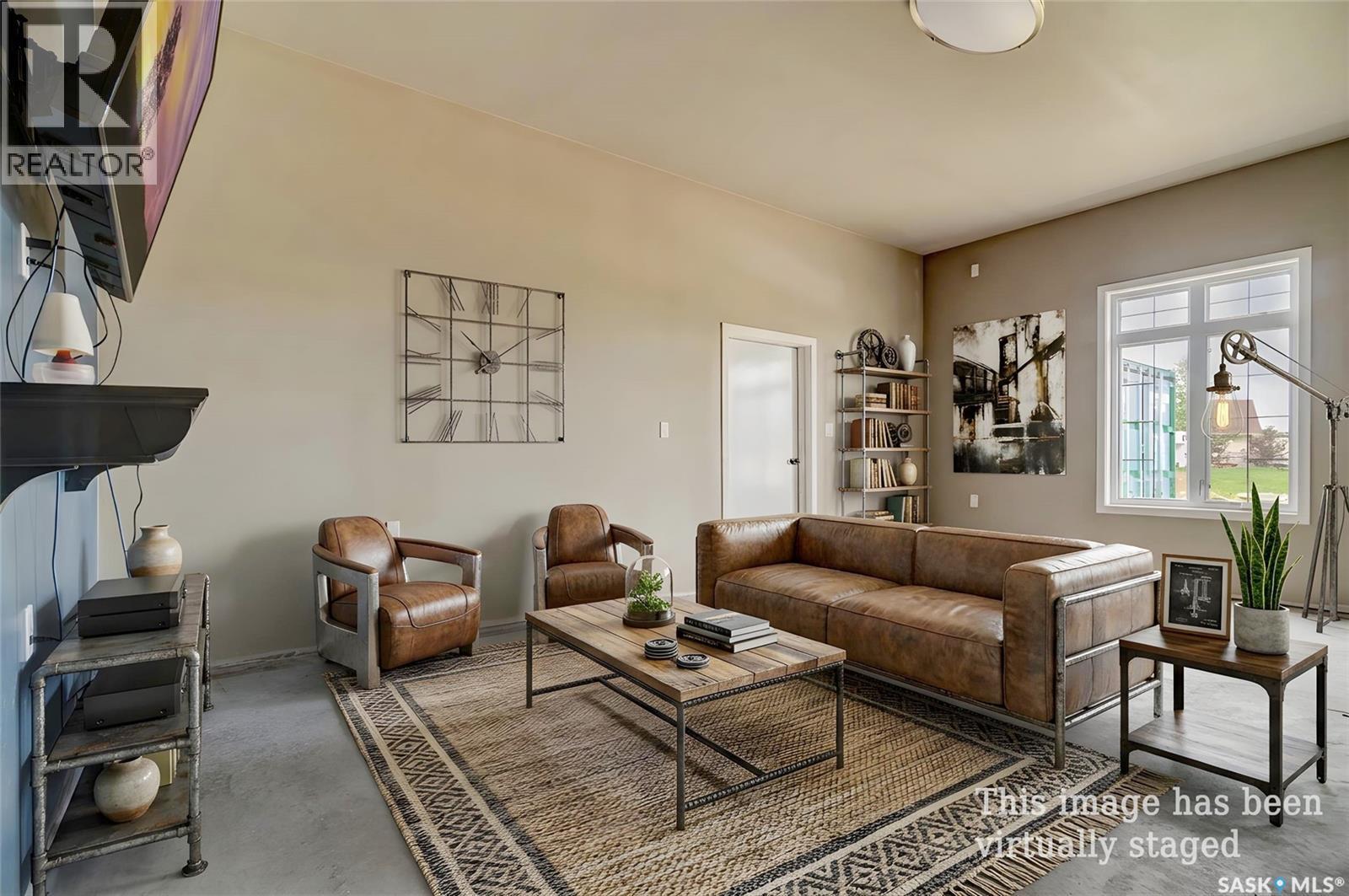 17 Longman Drive, Longlaketon Rm No. 219, SK - Indoor Photo Showing Living Room