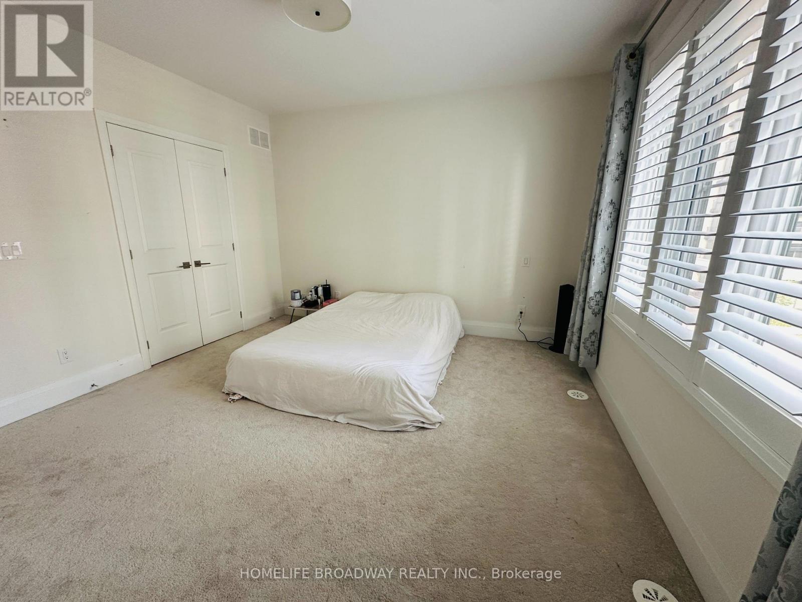 Th7 - 392 Highway 7 E, Richmond Hill, ON - Indoor Photo Showing Bedroom