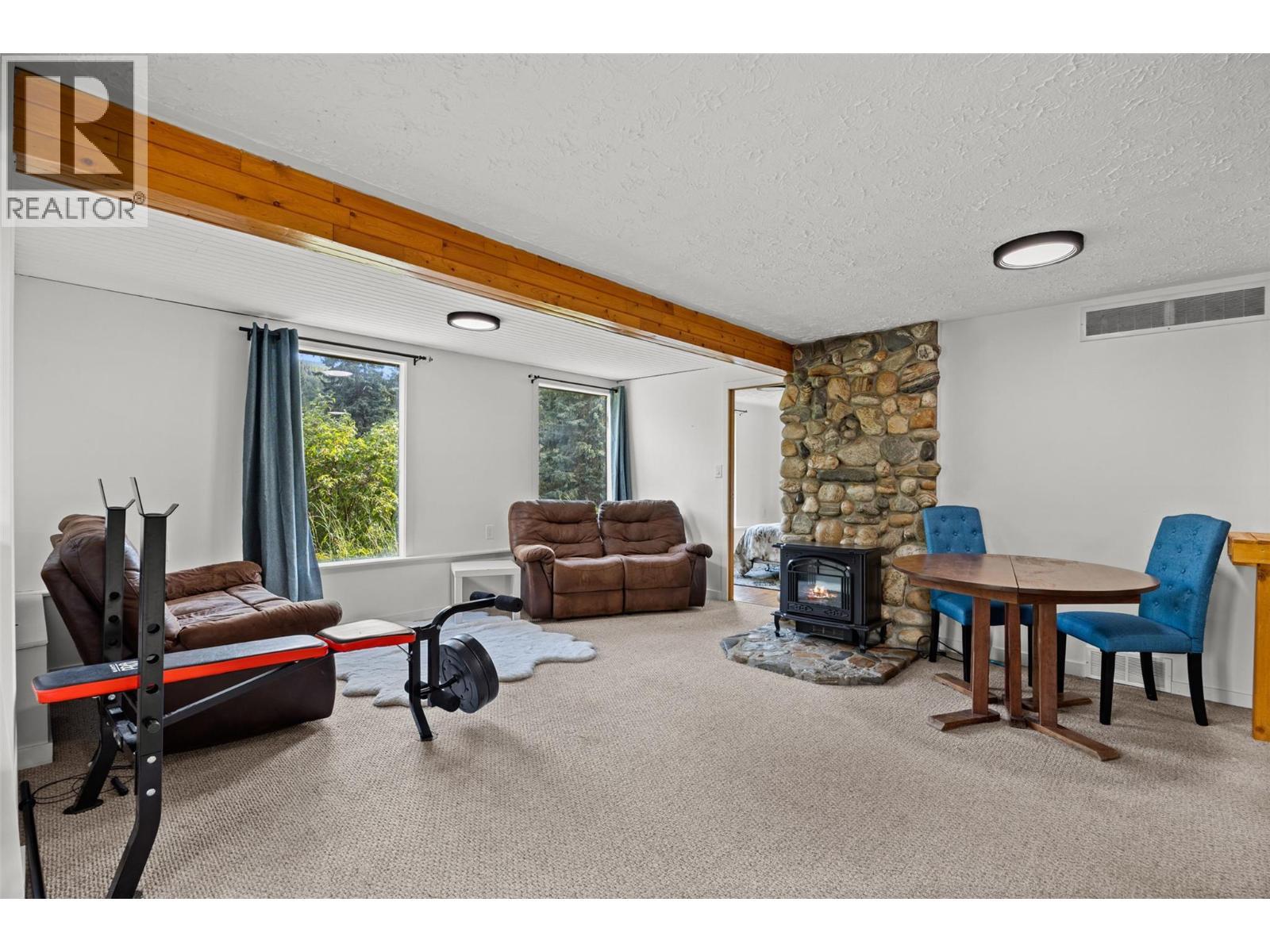 10737 Highway 33 E, Kelowna, BC - Indoor With Fireplace