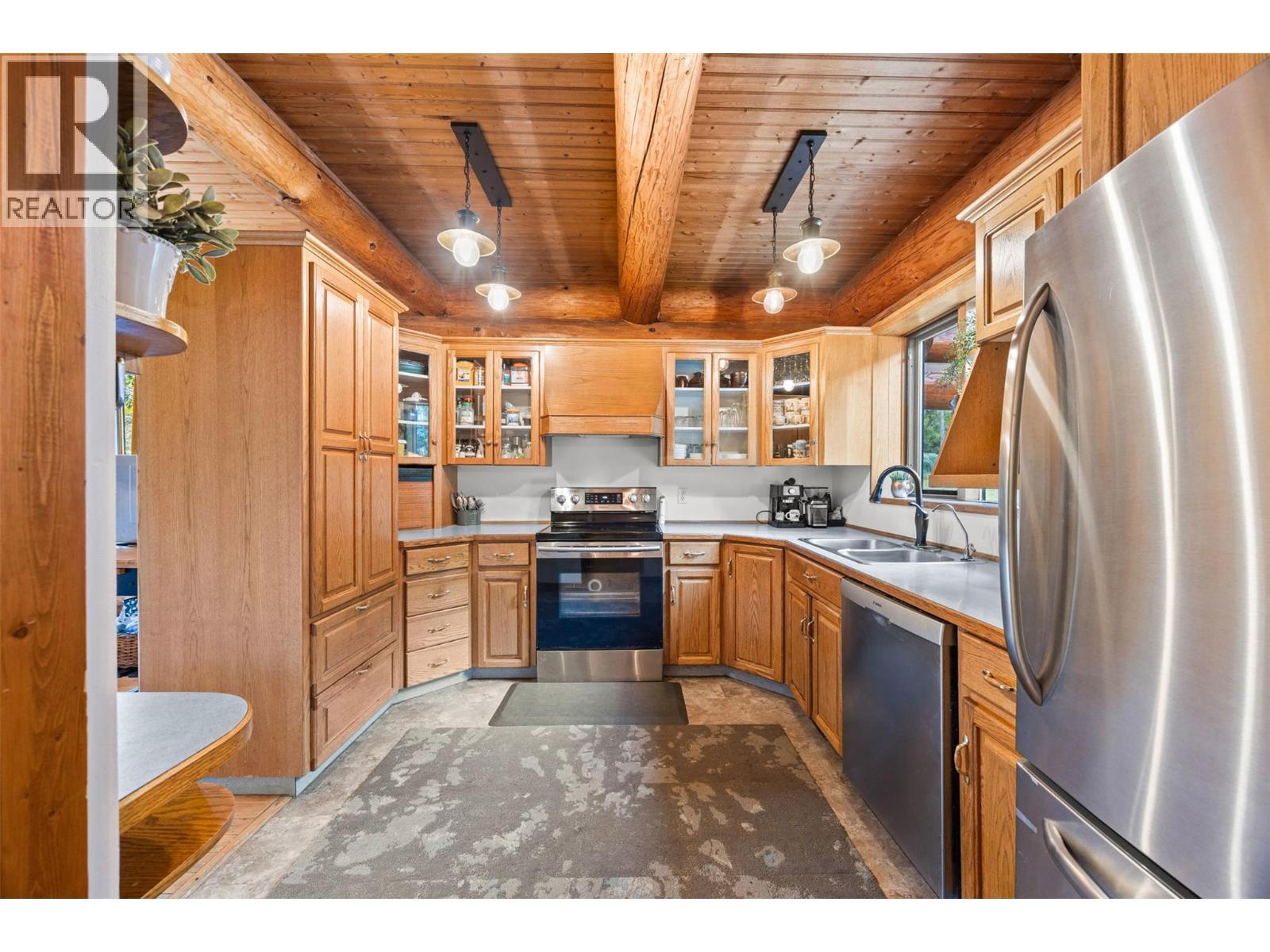 10737 Highway 33 E, Kelowna, BC - Indoor Photo Showing Kitchen With Stainless Steel Kitchen With Double Sink