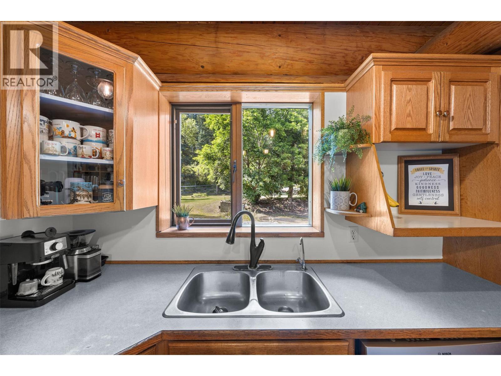 10737 Highway 33 E, Kelowna, BC - Indoor Photo Showing Kitchen With Double Sink