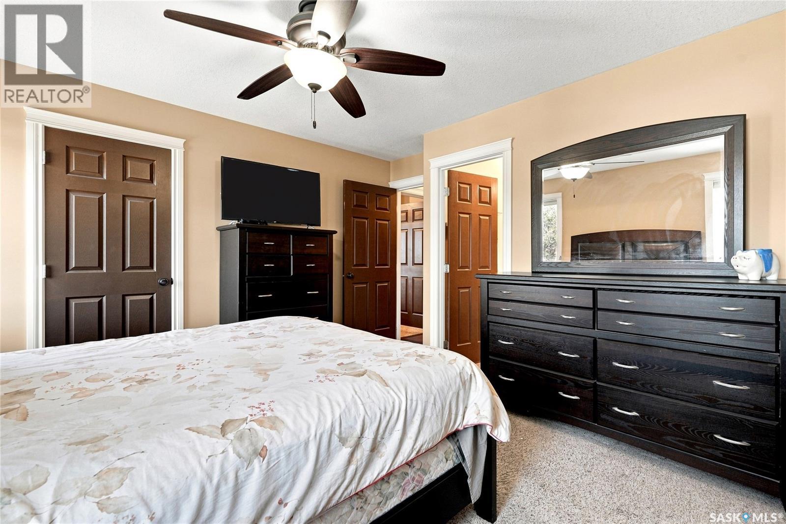 506 Antler Crescent, Warman, SK - Indoor Photo Showing Bedroom