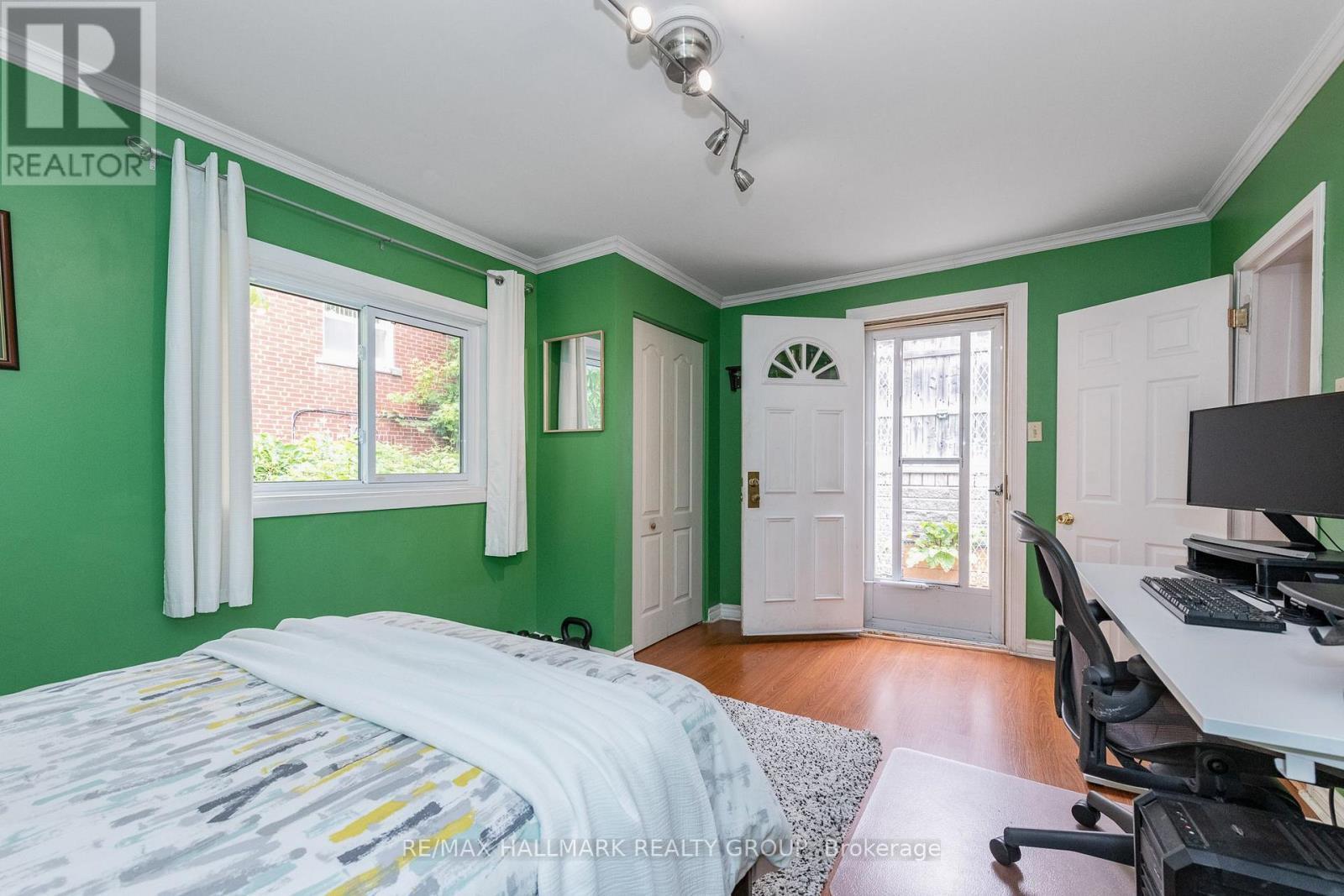 Main floor family room/guest bedroom - 53 Louisa Street, Ottawa, ON - Indoor Photo Showing Bedroom