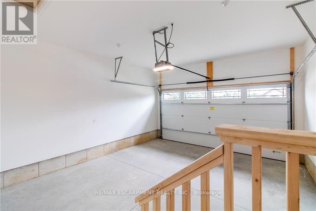 to-be-buit -Josie Model (for illustration only) - 96 Craddock Boulevard, Haldimand, ON - Indoor Photo Showing Garage