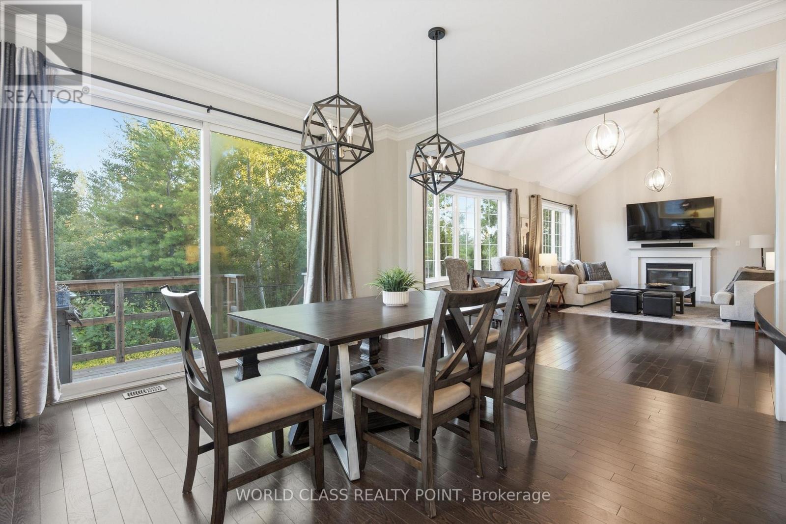 436 Cusick Circle, Milton, ON - Indoor Photo Showing Dining Room With Fireplace